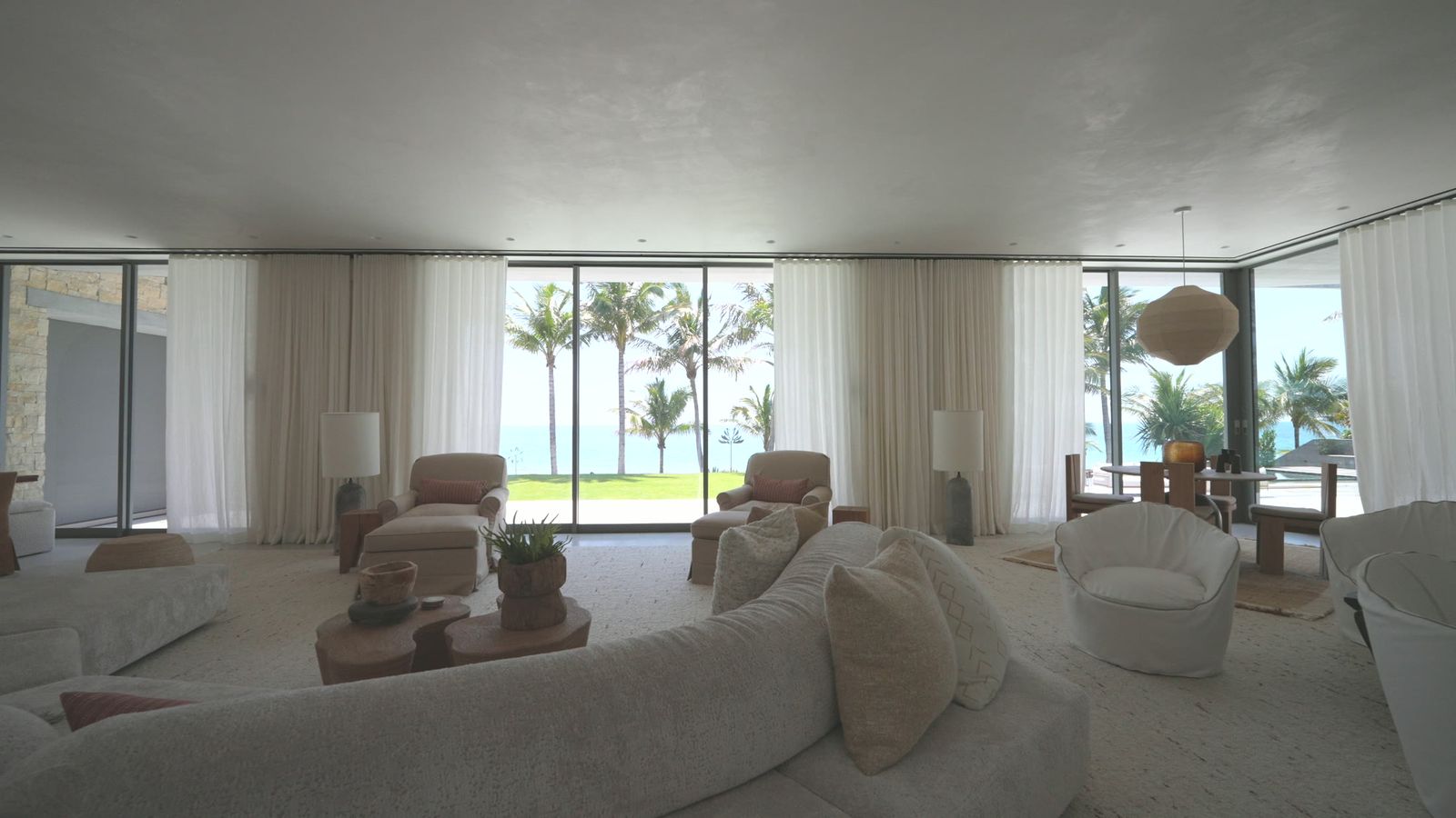 12,000 sq ft oceanfront estate in Fort Lauderdale with whole-home Lutron Palladiom shading and sheer draperies on customized Lutron tracks