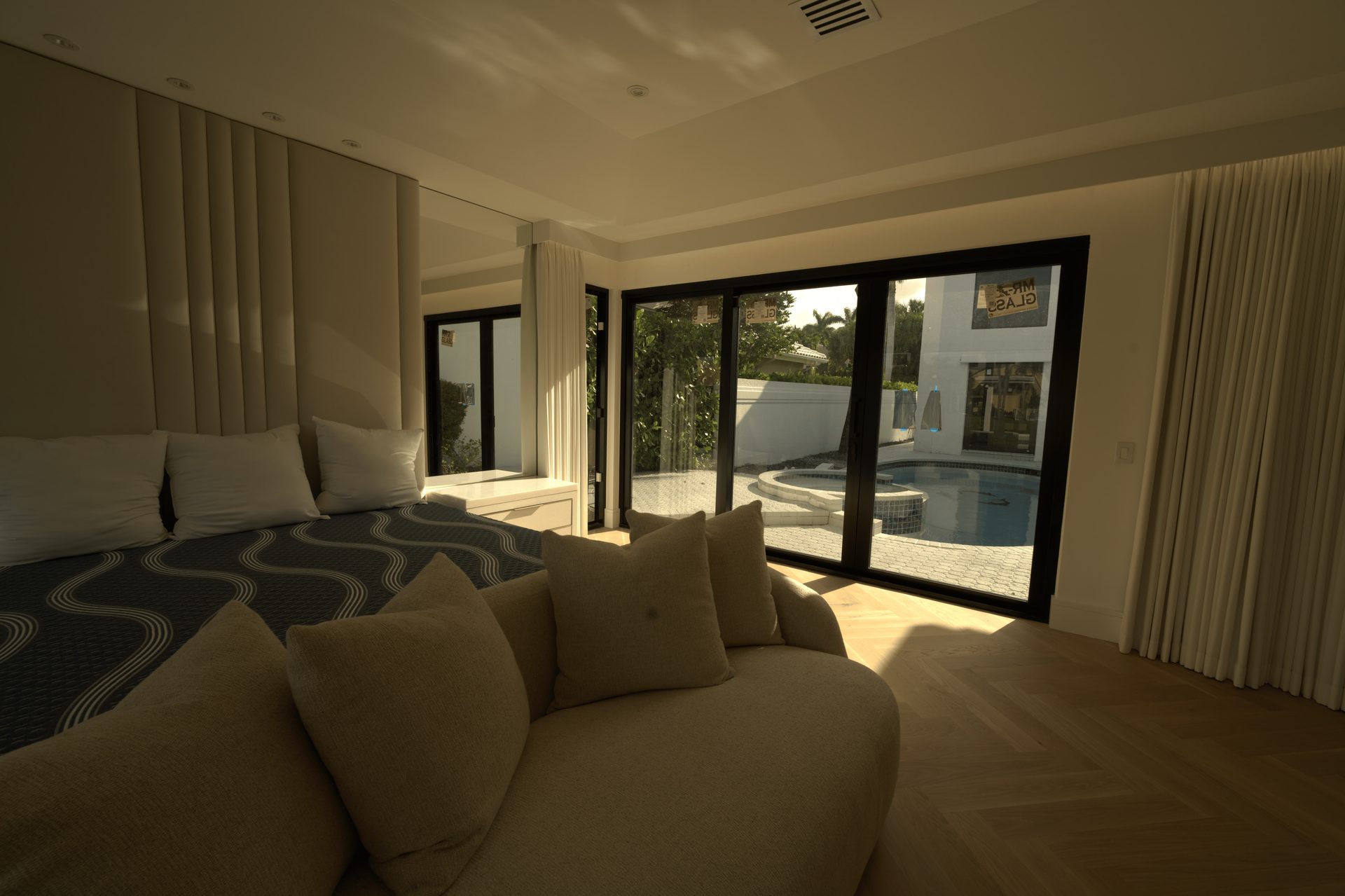 Floor-to-ceiling custom draperies in a South Florida residence